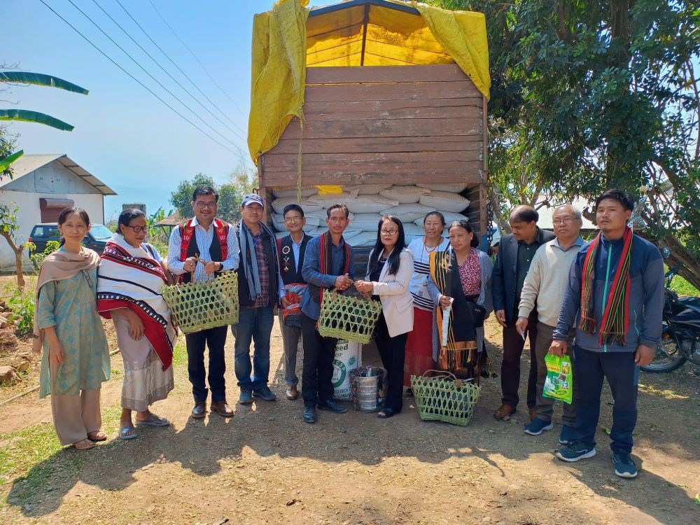 Participants and others during the awareness camp and piglet distribution programme held at NU:SAS Medziphema, on March 7.